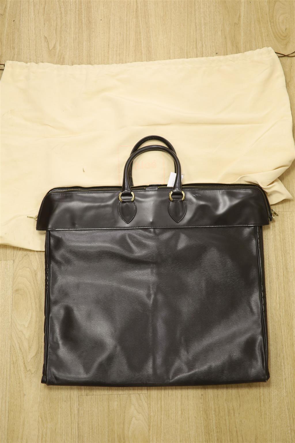 A Chloe folding suit bag, fully open 1.3 metres including handles